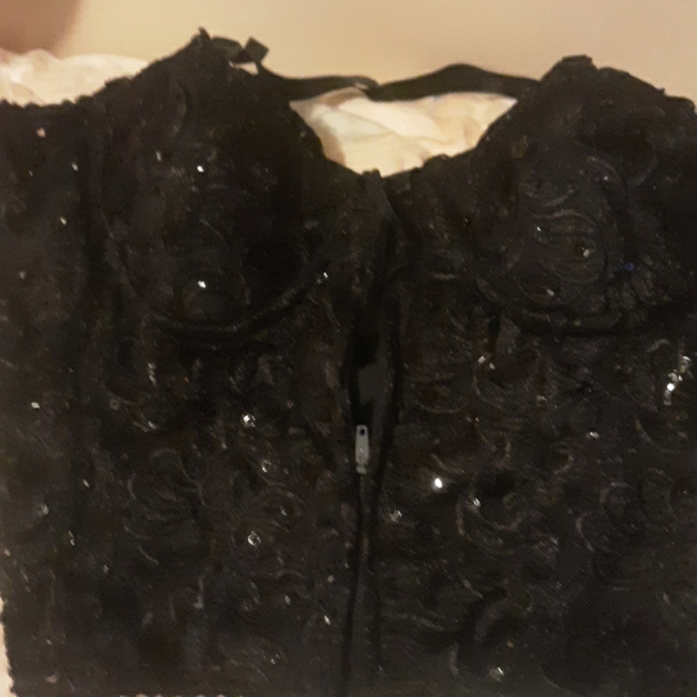 A women's two piece lace and glitter where's that